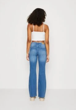Vero Moda VMSELINA - Flared Jeans - Medium Blue Denim -Vero Moda Verkäufe 4ac4e7efa6e44626b36bd9ce941f8cb6